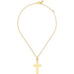 Cruces doradas Dolce & Gabbana 