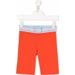 Pantalones cortos naranja de poliamida rebajados informales con logo DKNY talla L para mujer 