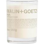 Velas aromáticas verdes de cuero Malin+Goetz 