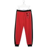 Pantalones rojos de algodón de deporte infantiles rebajados MOSCHINO 10 años 