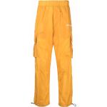 Pantalones estampados amarillos de poliamida rebajados con logo Palm Angels para hombre 
