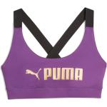 Ropa morada de running rebajada Puma talla S para mujer 