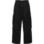 Pantalones casual negros de poliester informales con logo Nike Tech Pack para hombre 