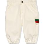 Jeans ajustables infantiles blancos de algodón con logo Gucci 